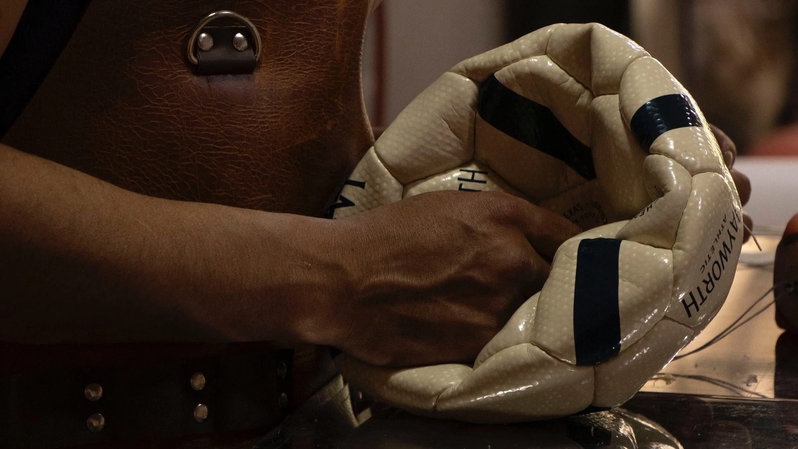 Hand stitching a soccer ball, Monguí
